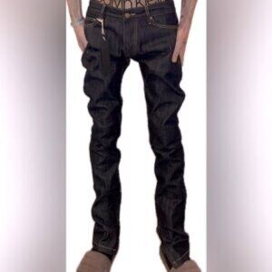 Stylish men's new, unworn (NWT) raw denim jeans from Fear of God, featuring a 30